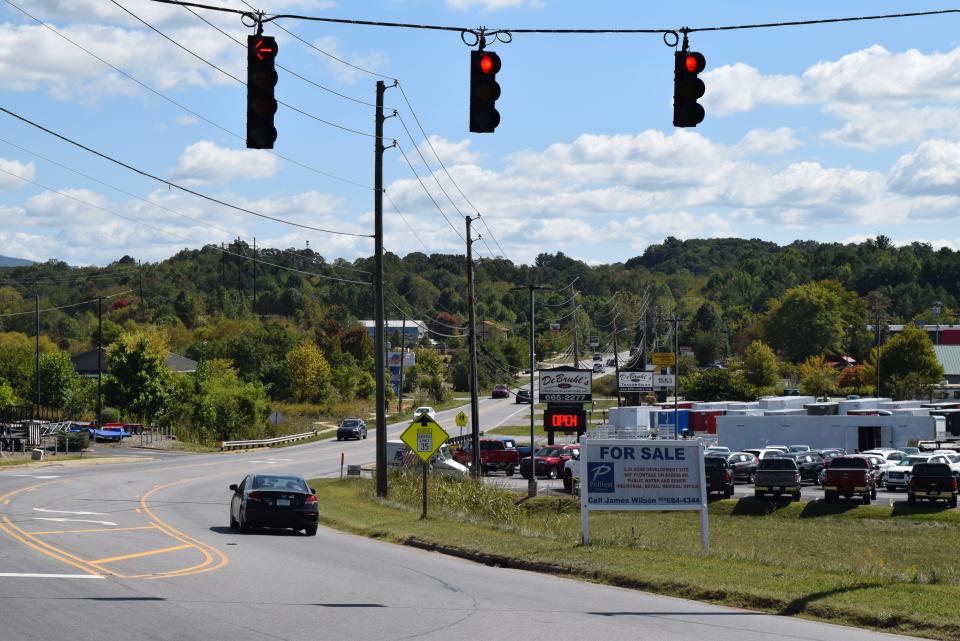 A "For Sale" sign outside of the lot for the proposed Bee Safe Storage on Sardis Road.