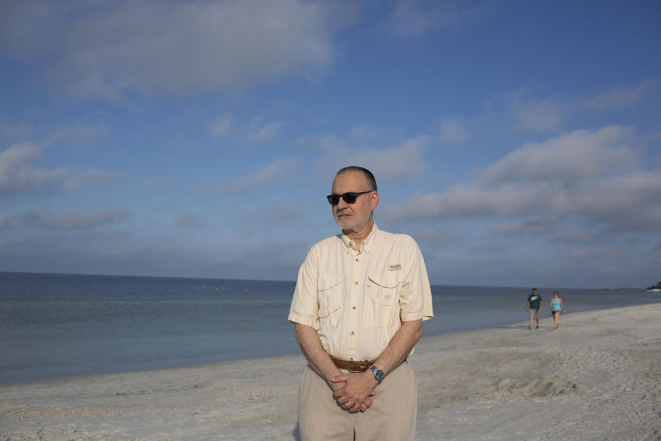 Sierra Club Florida Director Frank Jackalone at St. Pete Beach, Fla., where residents are still cautious about getting in the ocean water after a red tide was reported in recent months in St. Petersburg, Fla., Oct. 15, 2018. (Photo: Saul Martinez for Yahoo News)