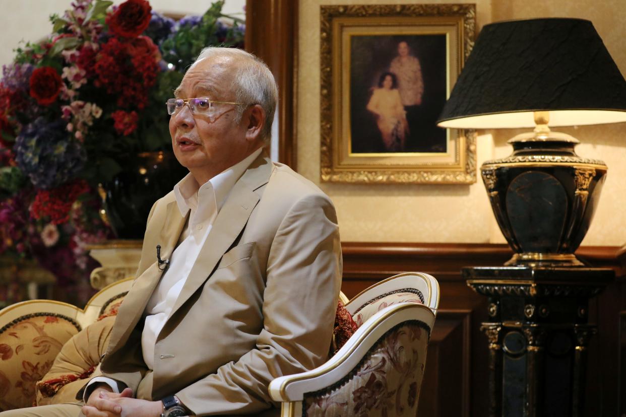 FILE PHOTO: Malaysia's former Prime Minister Najib Razak speaks during an interview with Reuters in Kuala Lumpur, Malaysia March 4, 2020. REUTERS/Lim Huey Teng