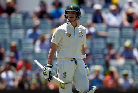 Cricket - Australia v South Africa - First Test cricket match - WACA Ground, Perth, Australia - 4/11/16. Australia's captain Steve Smith reacts as he walks off the ground after being given out LBW at the WACA Ground in Perth. REUTERS/David Gray