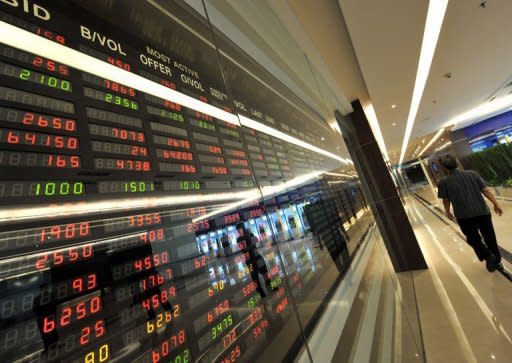 Asian shares were mixed in early trade on Tuesday with investors taking a breather from the previous day's rally as they nervously await a crucial summit aimed at tackling the eurozone debt crisis