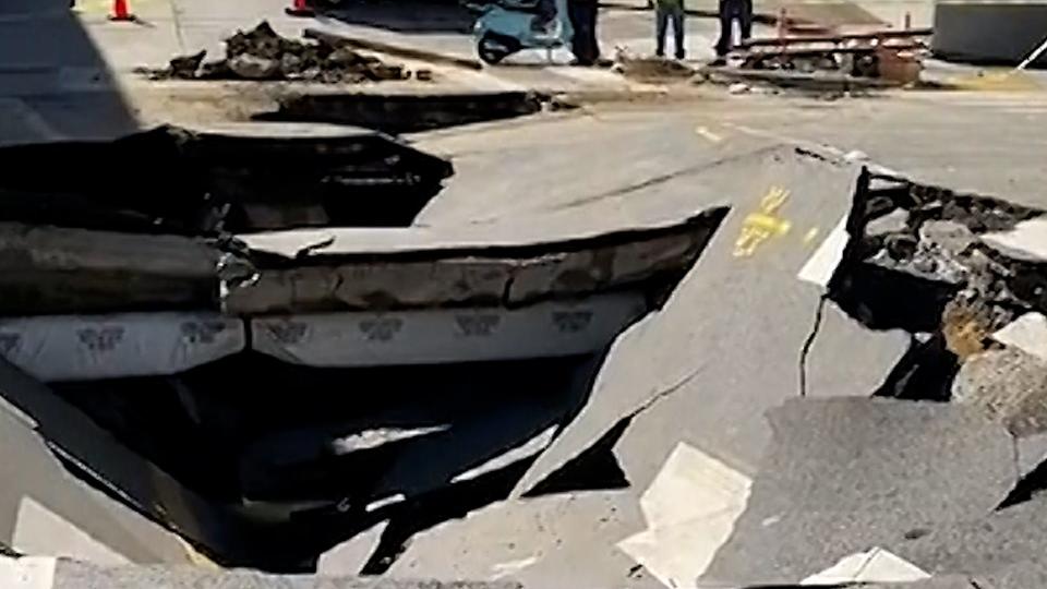 A water main break in San Francisco flooded homes Sunday and caused a massive sinkhole to open up.