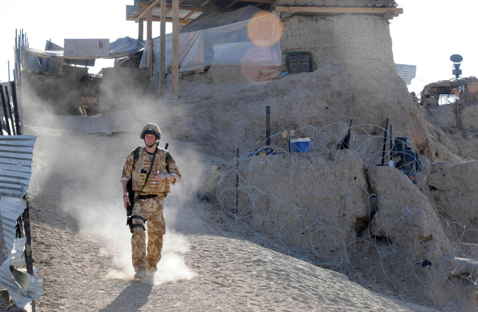 (NO PUBLICATION IN UK MEDIA FOR 28 DAYS) Prince Harry patrols the deserted town of Garmisir on January 2, 2008 in Helmand Province, Afghanistan. (Photo by Anwar Hussein Collection/ROTA/WireImage)