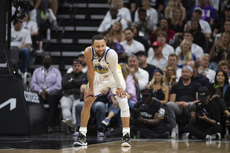 Golden State Warriors guard Stephen Curry watches late in the fourth quarter of Game 7 of an NBA basketball first-round playoff series against the Sacramento Kings on Sunday, April 30, 2023, in Sacramento, Calif. The Warriors won 120-100. (AP Photo/José Luis Villegas)