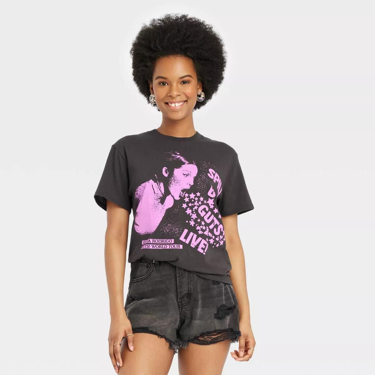 <p><a href="https://go.redirectingat.com?id=74968X1596630&url=https%3A%2F%2Fwww.target.com%2Fp%2Fwomen-s-exclusive-olivia-rodrigo-short-sleeve-graphic-t-shirt-black%2F-%2FA-90849689&sref=https%3A%2F%2F" rel="nofollow noopener" target="_blank" data-ylk="slk:Shop Now;elm:context_link;itc:0;sec:content-canvas" class="link rapid-noclick-resp">Shop Now</a></p><p>Target-Exclusive Guts Tour Graphic T-Shirt</p><p>target.com</p><p>$13.99</p>