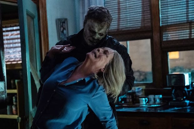 Jamie Lee Curtis as Laurie Strode struggles in a fight for her <a href="https://parade.com/937586/parade/life-quotes/" rel="nofollow noopener" target="_blank" data-ylk="slk:life;elm:context_link;itc:0;sec:content-canvas" class="link ">life</a> against Michael Myers in a scene from "Halloween Ends."<p>Daniel Green/Universal Pictures</p>