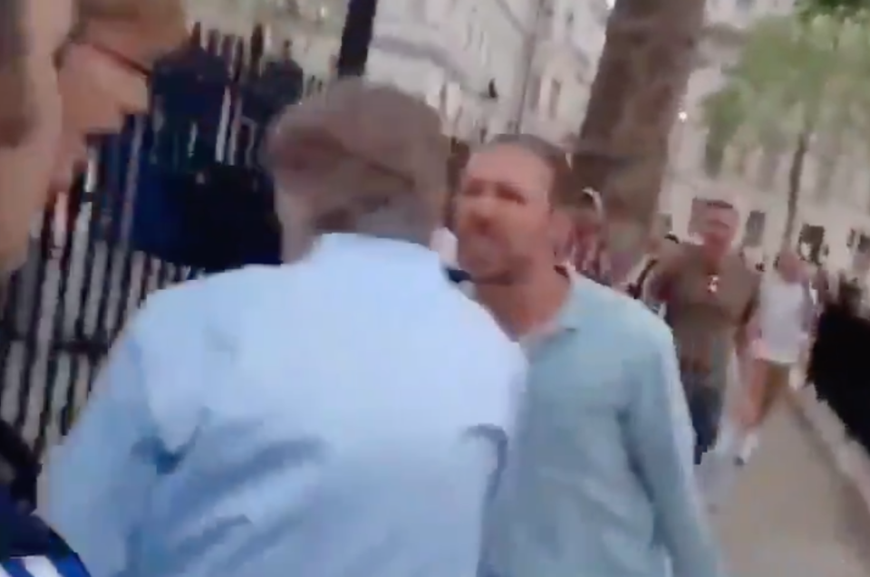 A protester shouts in Nicholas Watt’s face as he tries to avoid the angry crowd near Downing Street (Tonycarmelo15/Twitter)