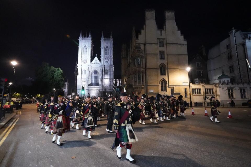 A funeral procession marches through Parliament Square during a rehearsal (PA)