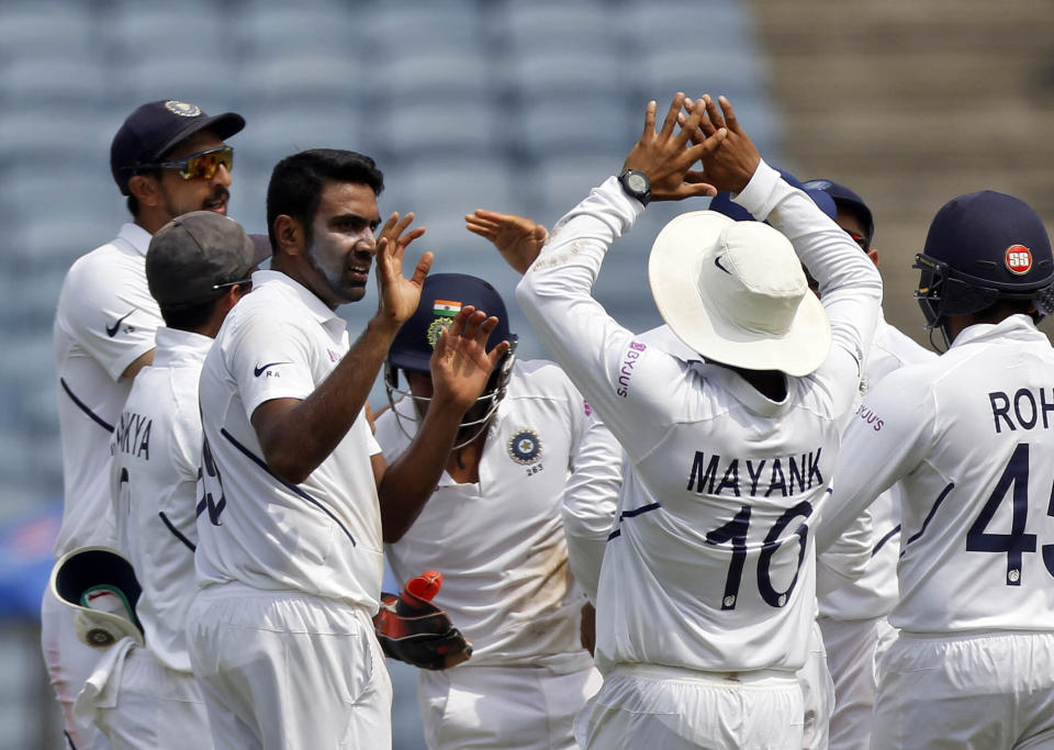 India's Ravichandran Ashwin celebrates the wicket of South Africa's Faf du Plessis during the fourth day of second cricket test match between India and South Africa in Pune, India, Sunday, Oct. 13, 2019. (AP Photo/Rajanish Kakade)
