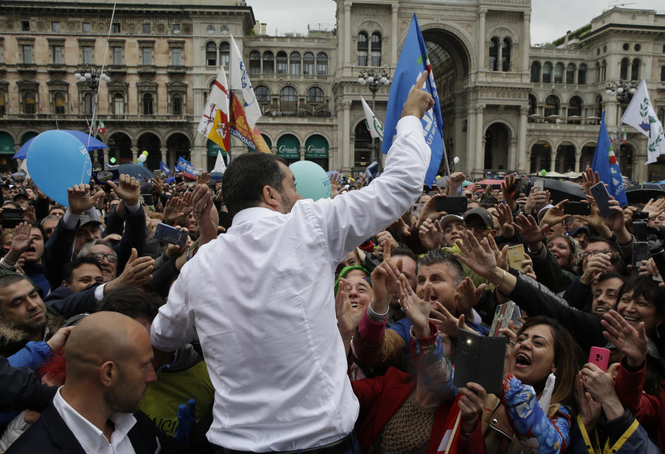 FILE - In this Saturday, May 18, 2019 file photo, supporters reach out to touch their leader during a rally organized by League leader Matteo Salvini, with leaders of other European nationalist parties, ahead of the May 23-26 European Parliamentary elections, in Milan, Italy. The European Parliament elections have never been so hotly anticipated or contested, with many predicting that this year’s ballot will mark a coming-of-age moment for the euroskeptic far-right movement. The elections start Thursday May 23, 2019 and run through Sunday May 26 and are taking place in all of the European Union’s 28 nations. (AP Photo/Luca Bruno, File)