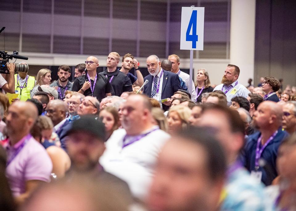 Southern Baptists debating a measure at the 2023 SBC annual meeting in New Orleans. Disagreements over women pastors dominated much of the debate at this year's annual meeting, whereas in previous years abuse reform has driven the discourse.