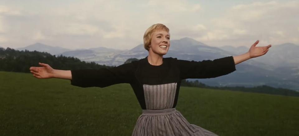 Julie Andrews singing in The Sound of Music hilltop scene