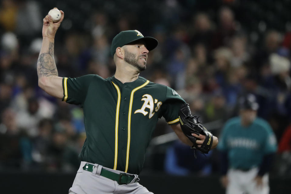 Oakland Athletics starting pitcher Mike Fiers throws against the Seattle Mariners during the first inning of a baseball game, Friday, Sept. 27, 2019, in Seattle. (AP Photo/Ted S. Warren)