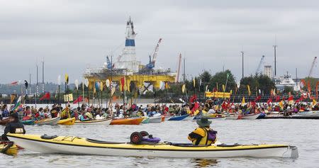 Activists protest the Shell Oil Company's drilling rig Polar Pioneer which is parked at Terminal 5 at the Port of Seattle, Washington May 16, 2015. REUTERS/Jason Redmond