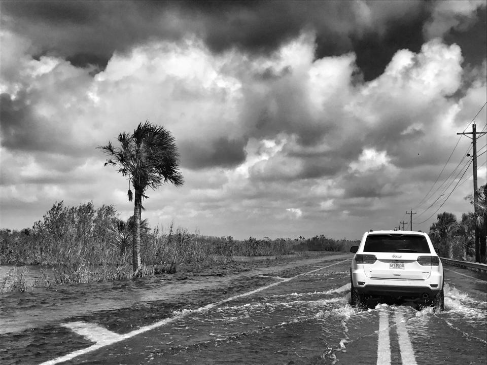 An SUV navigates a flooded road in the aftermath of Hurricane Irma in Ochopee, Fla. (Photo: Holly Bailey/Yahoo News)