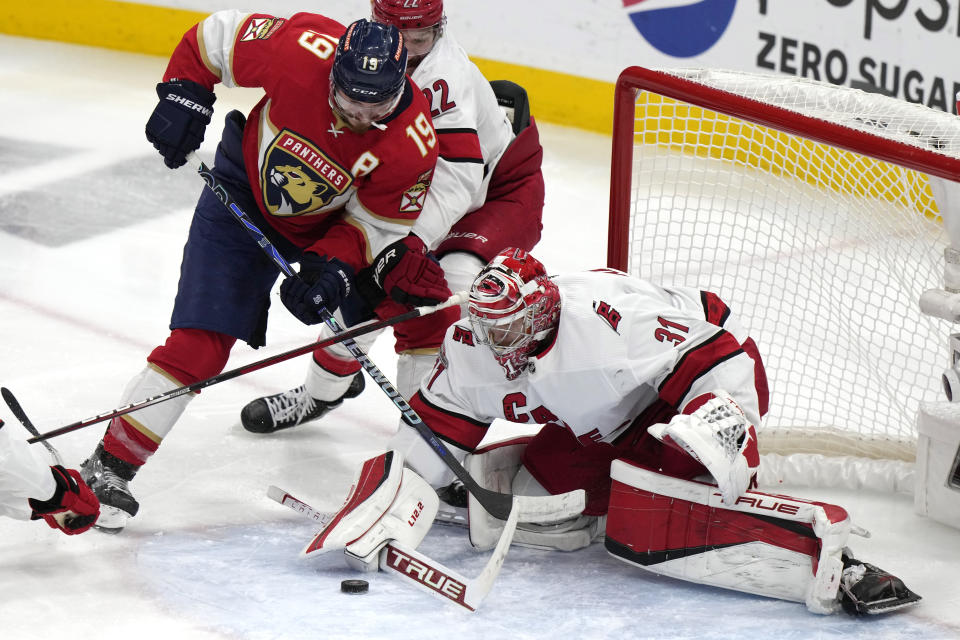 Carolina Hurricanes goaltender Frederik Andersen (31) defends against Florida Panthers left wing Matthew Tkachuk (19) during the second period of Game 4 of the NHL hockey Stanley Cup Eastern Conference finals Wednesday, May 24, 2023, in Sunrise, Fla. (AP Photo/Lynne Sladky)