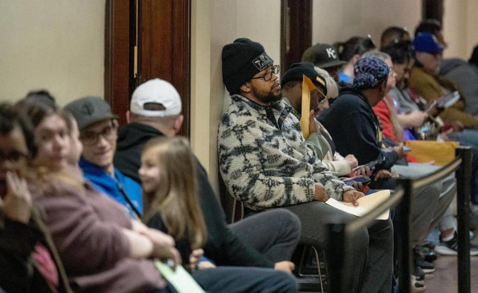 People wait in line to work with staff at the Jackson County Assessment office on Friday, March 29, 2024, in Independence, Missouri. Nick Wagner/nwagner@kcstar.com