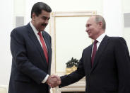 Russian President Vladimir Putin, right, shakes hands with Venezuela's President Nicolas Maduro during their meeting in the Kremlin in Moscow, Russia, Sept. 25, 2019. Nicolas Maduro is on a working visit to Moscow. (Sergei Chirikov/Pool Photo via AP)