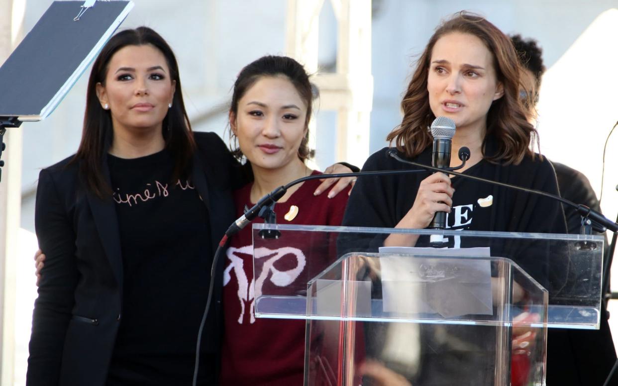Portman (right), speaking in Los Angeles, with actresses Eva Longoria (left) and Constance Wu - Barcroft Media