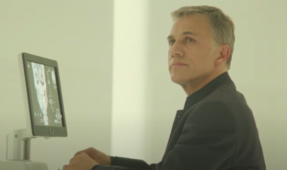 Christoph in the movie at a computer