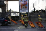 Emergency services at the Field's shopping center after a shooting, in Copenhagen, Denmark, Sunday July 3, 2022. Danish police say several people have been shot at a Copenhagen shopping mall. Copenhagen police said that one person has been arrested in connection with the shooting at the Field’s shopping mall on Sunday. Police tweeted that “several people have been hit” but gave no other details. (Olafur Steinar Gestsson/Ritzau Scanpix via AP)