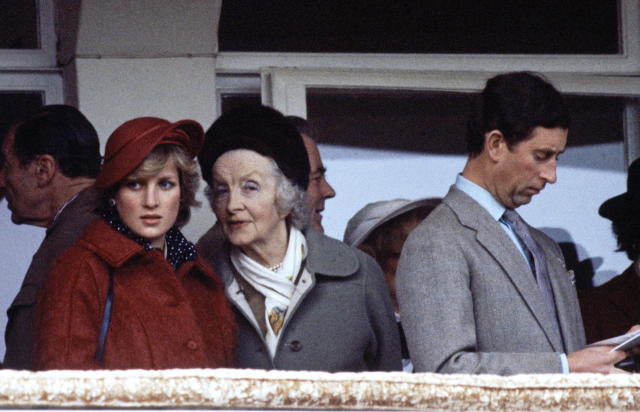 CHELTENHAM, UNITED KINGDOM - APRIL 03:  Diana, Princess Of Wales, Talking To Her Grandmother, Ruth, Lady Fermoy During The National Hunt Festival At Cheltenham.  Prince Charles Is Beside Them Reading A Racing Programme.  (Photo by Tim Graham Photo Library via Getty Images)