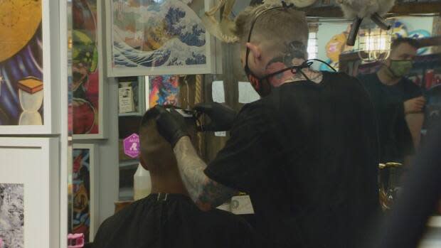 In Edmonton, some hair salons were overwhelmed with booking requests Sunday, the last day Albertans could get a haircut before new restrictions take effect.