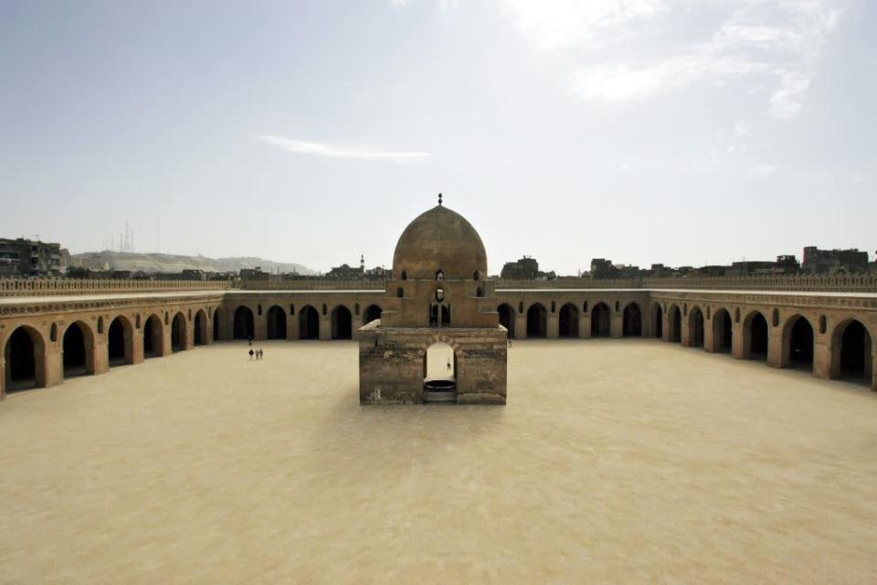 <b>CAIRO, EGYPT:</b> A view of the inner courtyard of the Ibn Tulun Mosque in Cairo, Egypt. The mosque, built by Ibn Tulun, the Abbassid governor of Egypt from 868–884, in 876 AD. It is one of the largest mosques in the world with an inner courtyard large enough for most of his army and their horses and the 13th century fountain in the centre of the courtyard continues to provide water for ablutions before prayers.