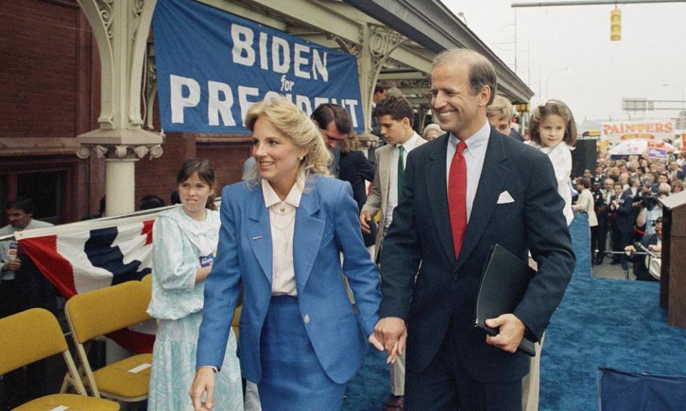 Joe Biden walks with his wife, Jill, after announcing his candidacy for president 9 June 1987, in Wilmington, Delaware.