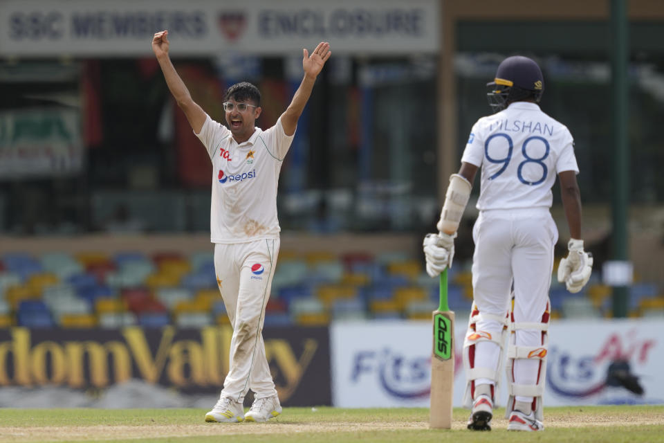Pakistan's Abrar Ahmed, left, appeals for the wicket of Sri Lanka's Asitha Fernando during the day one of the second cricket test match between Sri Lanka and Pakistan in Colombo, Sri Lanka on Monday, Jul. 24. (AP Photo/Eranga Jayawardena)