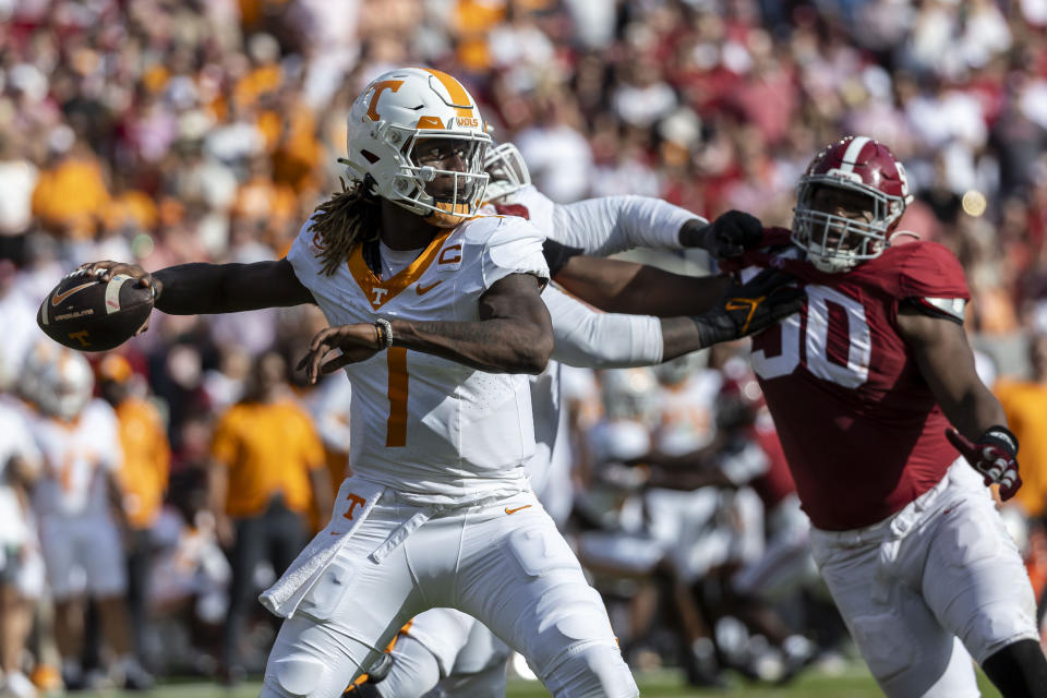 Tennessee quarterback Joe Milton III (7) throws a pass during the first half of an NCAA college football game against Alabama, Saturday, Oct. 21, 2023, in Tuscaloosa, Ala. (AP Photo/Vasha Hunt)