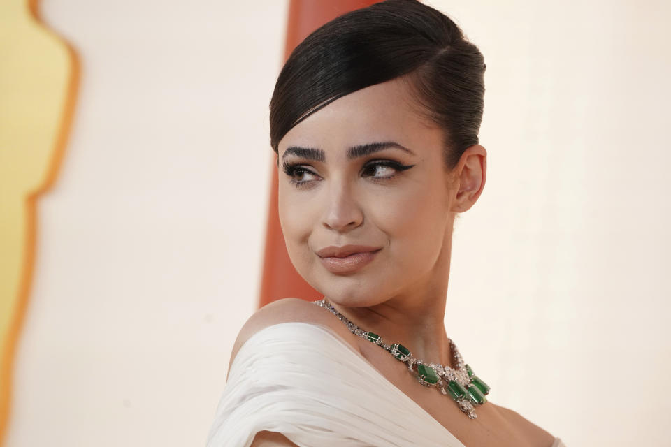 Sofia Carson arrives at the Oscars on Sunday, March 12, 2023, at the Dolby Theatre in Los Angeles. (Photo by Jordan Strauss/Invision/AP)