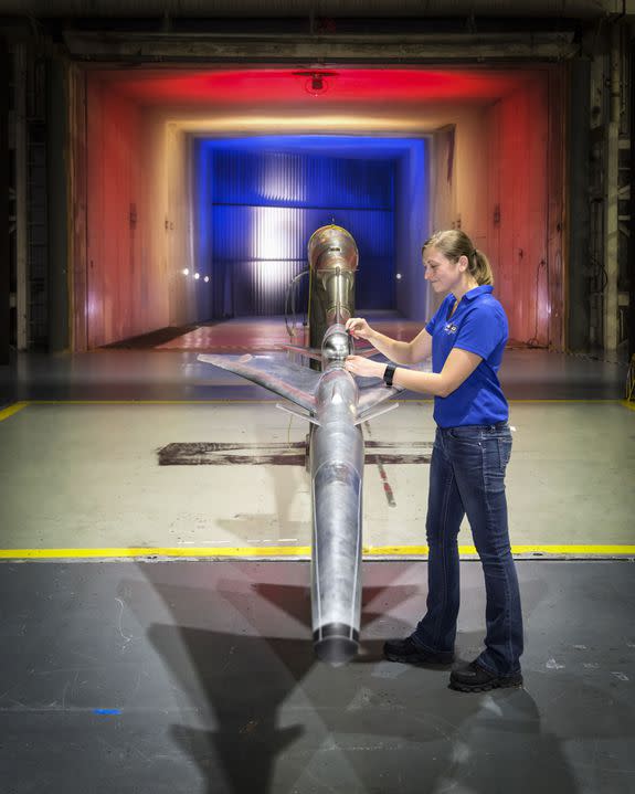 Test engineer Samantha O’Flaherty works on an X-Plane model.