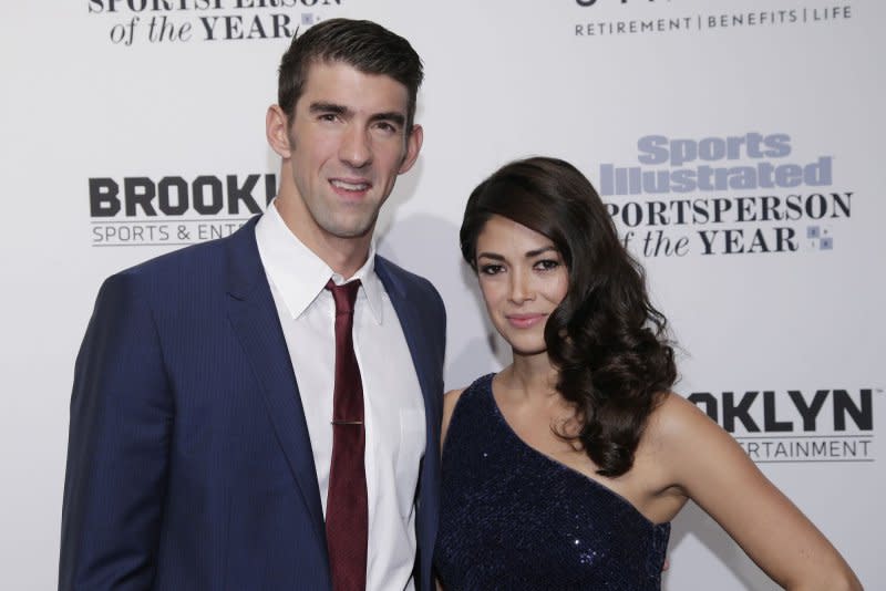Michael and Nicole Phelps attend the Sports Illustrated Sportsperson of the Year ceremony in 2016. File Photo by John Angelillo/UPI
