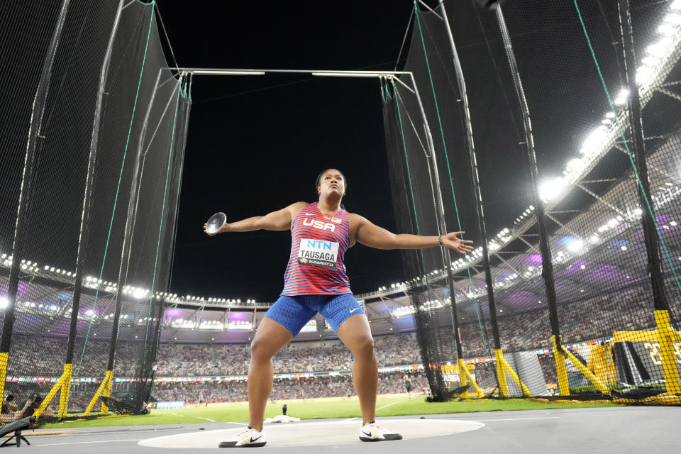 Laulauga Tausaga, of the United States, reacts after an attempt in the Women's discus throw final during the World Athletics Championships in Budapest, Hungary, Tuesday, Aug. 22, 2023. (AP Photo/Matthias Schrader)