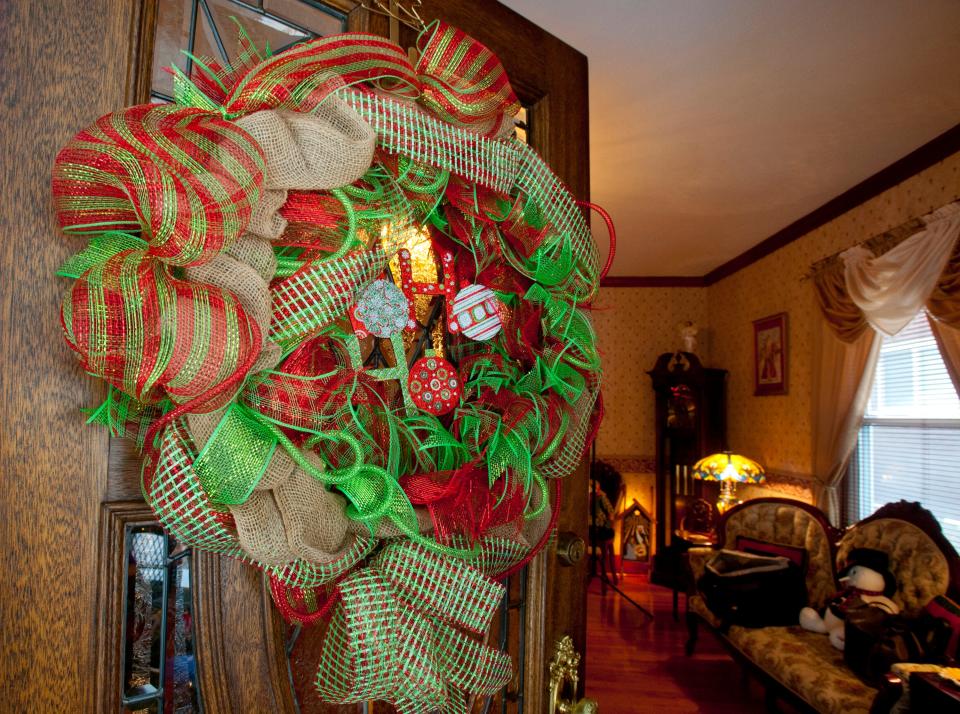 A large Christmas wreath welcomes visitors through the front door of Chis and Kerrie Clifford's Portland home.04 December 2018