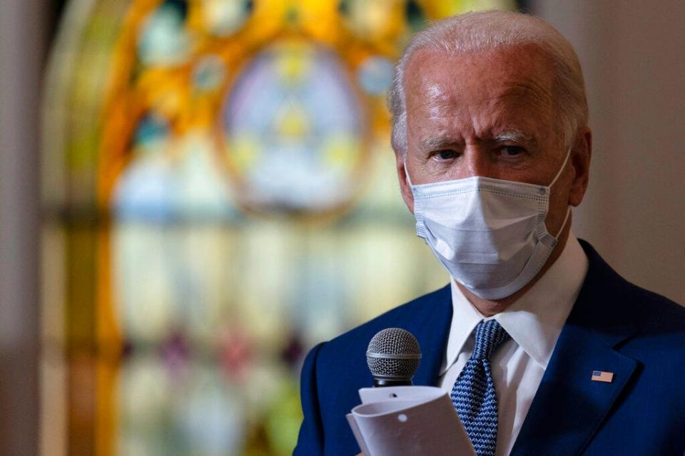 Democratic presidential candidate former Vice President Joe Biden meets with members of the community at Grace Lutheran Church in Kenosha, Wis., Thursday.