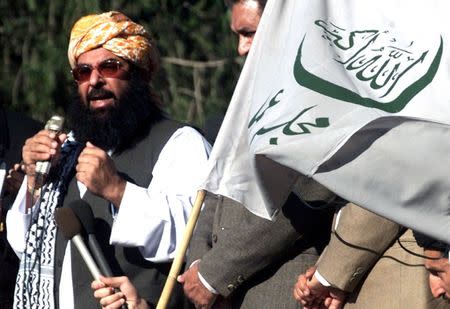 FILE PHOTO - Ghafoor Haideri speaks during an anti-U.S. rally in Islamabad, Pakistan, January 31, 2003. REUTERS/Mian Khursheed/File Photo