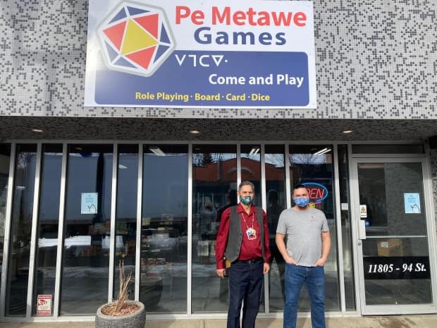 Elder Francis Whiskeyjack,left, held a smudging and prayer ceremony for Pe Metawe Games in the Alberta Avenue neighbourhood. David Plamondon, right, opened up the shop to create an inclusive space for tabletop gaming.