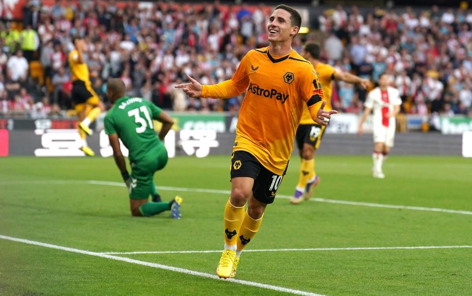 Daniel Podence celebrates scoring the winner as Wolves notched up their first win of the season - PA