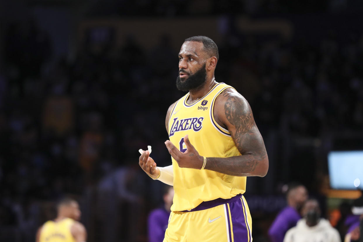 LOS ANGELES, CALIFORNIA - DECEMBER 21: LeBron James #6 of the Los Angeles Lakers reacts during the game against the Phoenix Suns at Staples Center on December 21, 2021 in Los Angeles, California. NOTE TO USER: User expressly acknowledges and agrees that, by downloading and/or using this photograph, User is consenting to the terms and conditions of the Getty Images License Agreement. (Photo by Meg Oliphant/Getty Images )