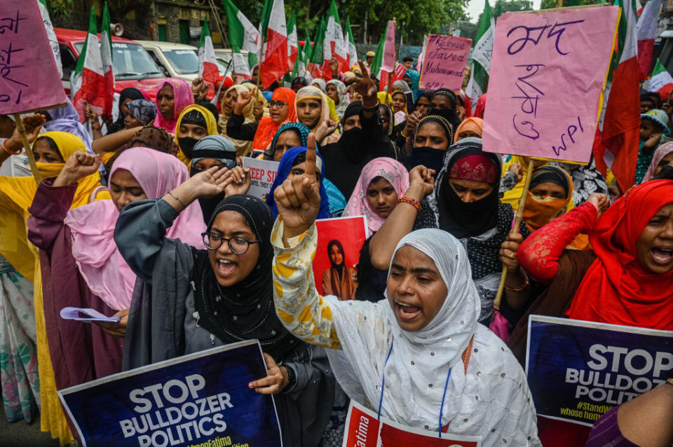 Muslim women shout slogans during a demonstration in support of Muslim activist Afreen Fatima, in Kolkata on June 15, 2022.<span class="copyright">Sankhadeep Banerjee—NurPhoto/Getty Images</span>