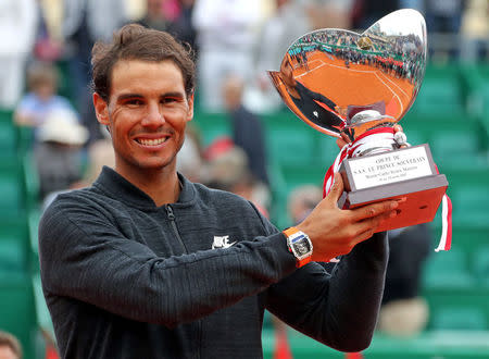 Tennis - Monte Carlo Masters - Monaco - 23/04/17 - Rafael Nadal of Spain poses with his trophy after winning his final tennis match against his compatriot Albert Ramos-Vinolas at the Monte Carlo Masters. REUTERS/Eric Gaillard