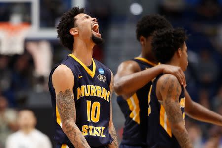 Mar 21, 2019; Hartford, CT, USA; Murray State Racers guard Tevin Brown (10) reacts during a timeout during the second half of a game against the Marquette Golden Eagles in the first round of the 2019 NCAA Tournament at XL Center. Mandatory Credit: David Butler II-USA TODAY Sports