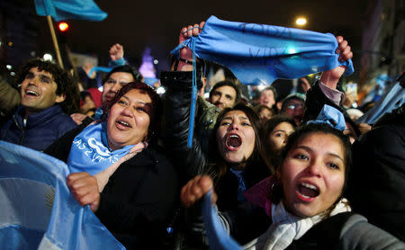 Anti-abortion rights activists celebrate lawmakers voted against a bill legalizing abortion, in Buenos Aires, Argentina August 9, 2018. REUTERS/Agustin Marcarian