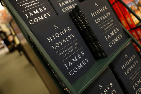 Copies of James Comey's book "A Higher Loyalty" are pictured in a book store in the Manhattan borough of New York City, New York, U.S., April 17, 2018. REUTERS/Mike Segar