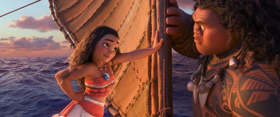 Tenacious teenager Moana (voice of Auli'i Cravalho) recruits demigod Maui (Dwayne Johnson) to help her become a master wayfinder in the animated 'Moana.'