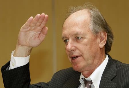 Tom Byrne, senior vice president of Moody's Investors Service, gestures as he answers media queries during the Asian Development Bank meeting in Manila May 2, 2012. REUTERS/Cheryl Ravelo