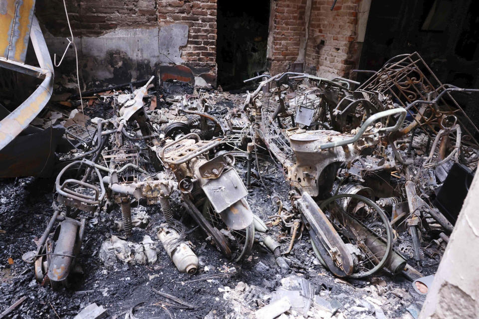 This photo shows the aftermath of a fire at a house in Hanoi, Vietnam Friday, May 24, 2024. Authorities said the fire has killed a number of people and injured a few others. (An Van Dang/VNA via AP)