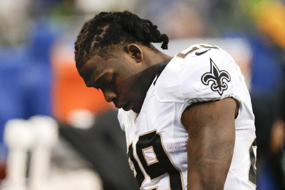 New Orleans Saints running back Khiry Robinson walks off the field after an NFC divisional playoff NFL football game against the Seattle Seahawks in Seattle, Saturday, Jan. 11, 2014. The Seahawks won 23-15. (AP Photo/Ted S. Warren)